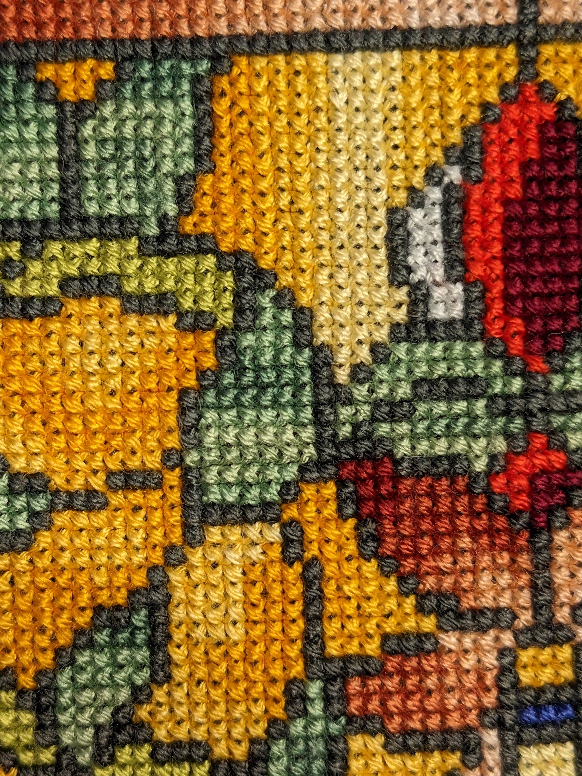 A closeup detail of some of the stitching of the TARDIS piece depicted in image 1